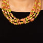 Paparazzi Accessories - Layered Lass - Multi Necklaces varying in shape and color, a collection of milky round and oval Peach Pink, Leek Green, and Macchiato beads are threaded along invisible wires below the collar. Shiny silver cube beads are sprinkled throughout the strands, adding hints of shimmer to the vibrant layers. Features an adjustable clasp closure.   Sold as one individual necklace. Includes one pair of matching earrings.