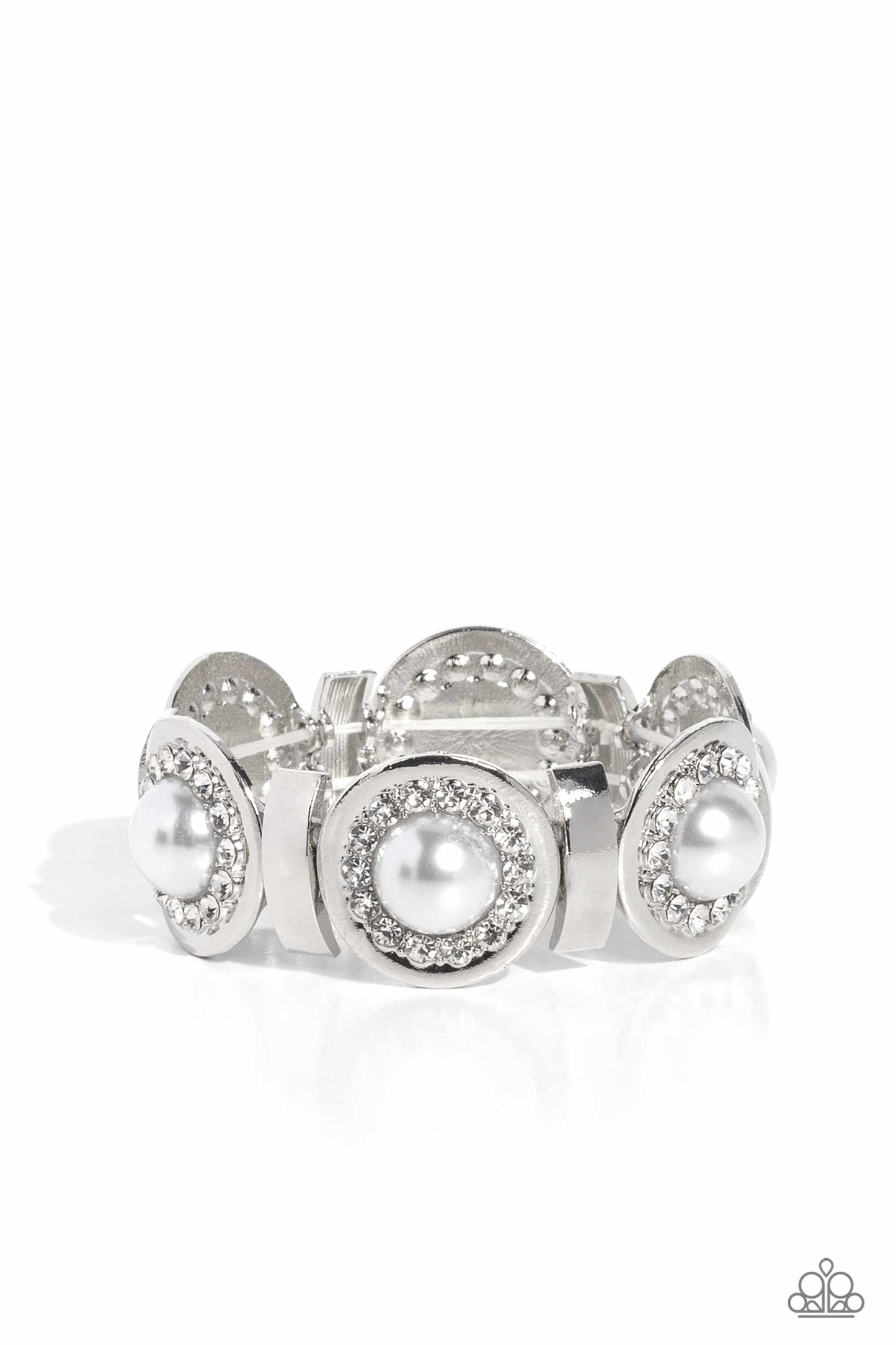 Paparazzi Accessories - Summer Serenade - White Pearl June 2023 LOP Bracelet boncaved silver frames, with an embossed row of white gems, encircle an oversized pearl center creating refined flowers. Sleek curls of silver alternate between the bejeweled flowers for additional shine and capricious shimmer along the wrist on stretchy bands.  Sold as one individual bracelet.