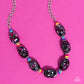 Paparazzi Accessories - No Laughing SPLATTER - Pink Necklaces featuring a hot pink, white, and silver paint splatter, oversized black beads loop around the collar from a classic silver link chain. Silver floral fittings and small discs in shades of hot pink, yellow, turquoise, and purple separate the splattered beads for additional whimsy and zest. Features an adjustable clasp closure.  Sold as one individual necklace. Includes one pair of matching earrings.