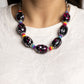 Paparazzi Accessories - No Laughing SPLATTER - Pink Necklaces featuring a hot pink, white, and silver paint splatter, oversized black beads loop around the collar from a classic silver link chain. Silver floral fittings and small discs in shades of hot pink, yellow, turquoise, and purple separate the splattered beads for additional whimsy and zest. Features an adjustable clasp closure.  Sold as one individual necklace. Includes one pair of matching earrings.