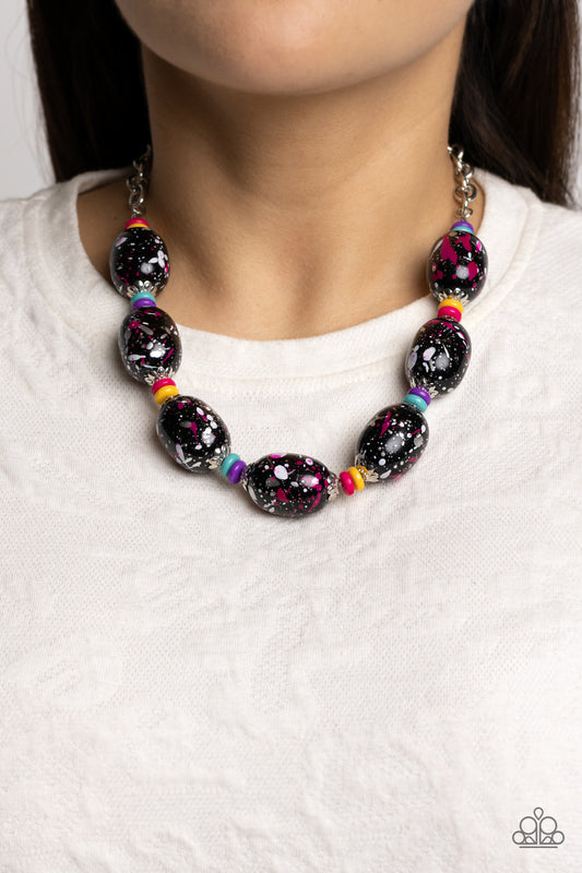 Paparazzi Accessories - No Laughing SPLATTER - Pink Necklaces featuring a hot pink, white, and silver paint splatter, oversized black beads loop around the collar from a classic silver link chain. Silver floral fittings and small discs in shades of hot pink, yellow, turquoise, and purple separate the splattered beads for additional whimsy and zest. Features an adjustable clasp closure.  Sold as one individual necklace. Includes one pair of matching earrings.