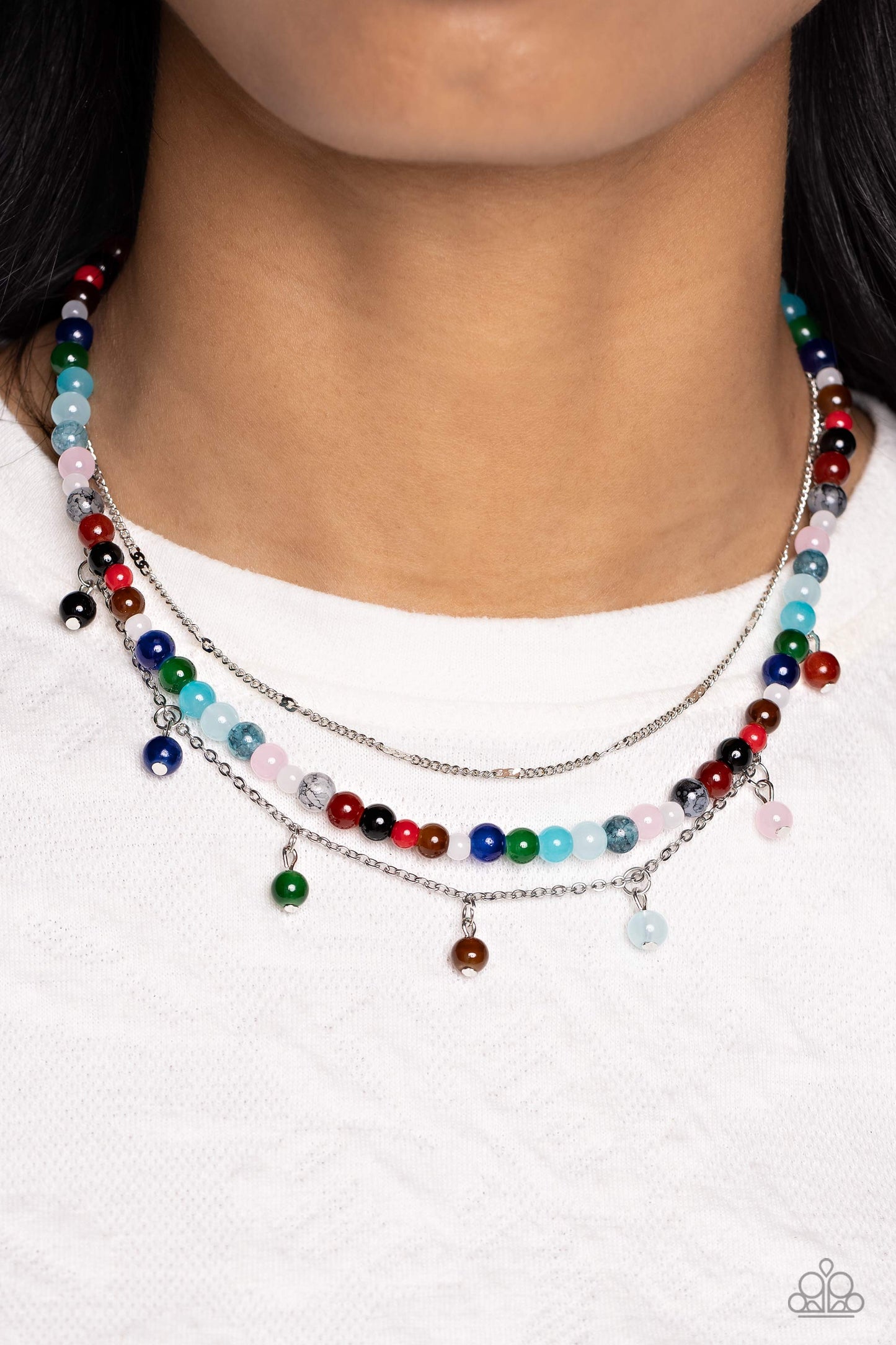 Paparazzi Accessories - BEAD All About It - Multi Necklaces a strand of multicolored stone beads is paired with two strands of classic silver chain, creating effortless layers along the neckline. One of the silver chains is dotted with sections of flattened silver bars, while the other is adorned with a sampling of colorful stone beading that infuses the design with playful movement. Features an adjustable clasp closure.  Sold as one individual necklace. Includes one pair of matching earrings.