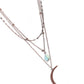 Paparazzi Accessories - Lunar Landslide - Copper Necklaces three dainty copper chains delicately layer below the collar. Antiqued copper links form the uppermost chain, while a turquoise stone teardrop bead rests amidst copper studs on the centermost chain. A copper crescent moon pendant swings from the bottom of the display for a mystical finish. Features an adjustable clasp closure. As the stone elements in this piece are natural, some color variation is normal. Sold as one individual necklace.