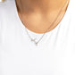 Paparazzi Accessories - Initially Yours - "T" White Necklaces embossed with dainty white rhinestones, a silver letter "T" hovers below the collar from a dainty silver chain, for a sentimentally simple design. Features an adjustable clasp closure.  Sold as one individual necklace. Includes one pair of matching earrings.
