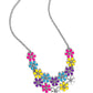 Painted in vivacious shades of hot pink, turquoise, yellow, purple, and white, a collection of silver studded flowers glide across the chest from a dainty silver chain for a whimsical array. Features an adjustable clasp closure. Painted in vivacious shades of hot pink, turquoise, yellow, purple, and white, a collection of silver studded flowers glide across the chest from a dainty silver chain for a whimsical array. Features an adjustable clasp closure.  Featured inside The Preview at Made for More!