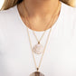 Paparazzi Accessories - Striped Style - White Necklaces two strands of classic gold chains fall into tiered layers as they cascade down the chest. Varying sizes of gold discs hammered in rippling texture and painted with a glossy white slide along each chain in a dizzying display, with a thin line of gold peeking at the center of the lowermost exaggerated pendant.  Sold as one individual necklace. Includes one pair of matching earrings.