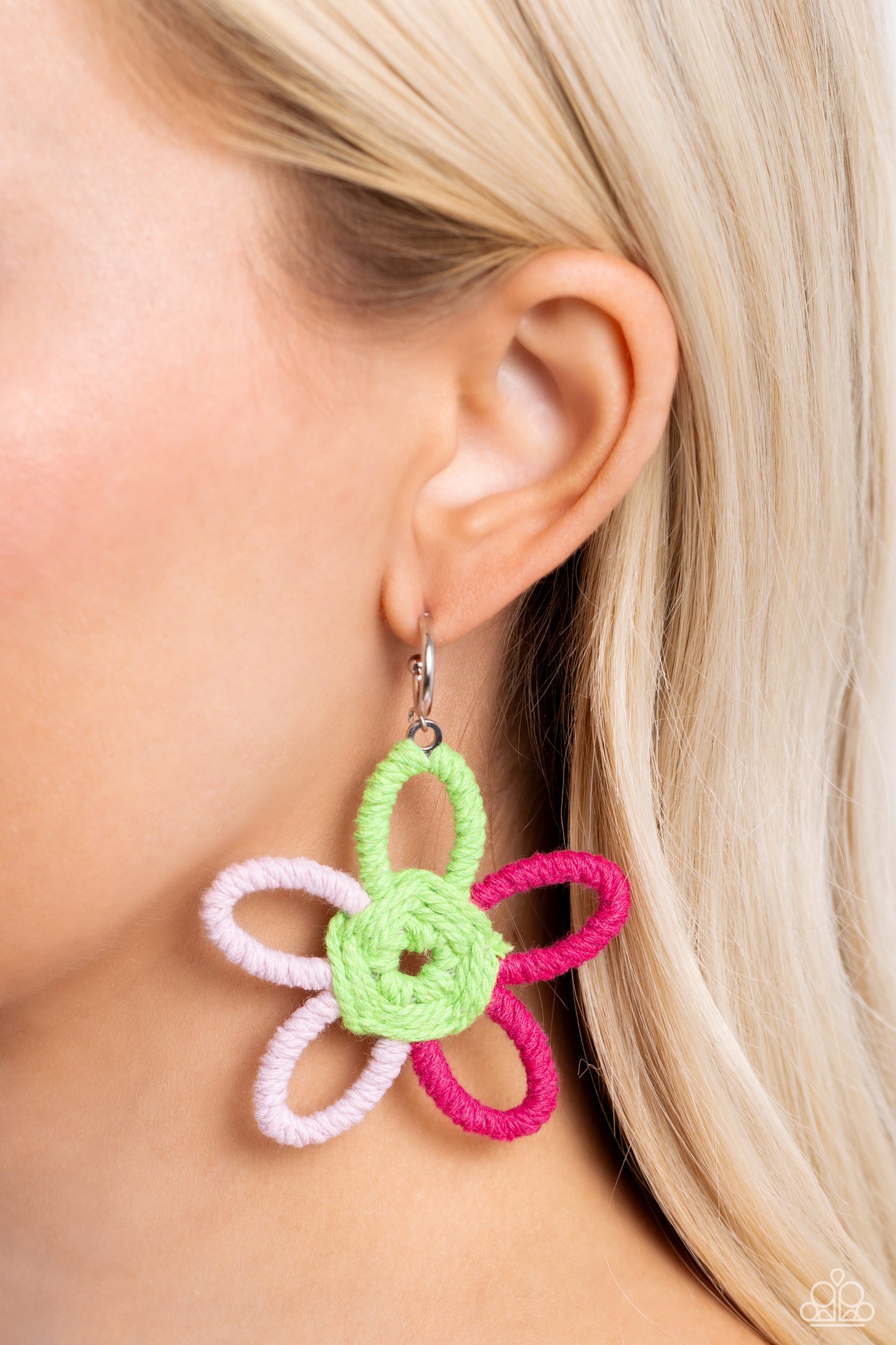 Paparazzi Accessories - Spin a Yarn - Pink Earrinyarfeaturing Kohlrabi, light pink, and Pink Peacock yarn, an oversized flower swings freely from a dainty silver hoop, creating a playful lure. Earring attaches to a standard post fitting. Hoop measures approximately 1/2" in diameter.  Sold as one pair of hoop earrings.