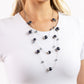 Paparazzi Accessories - Glistening Gamut - Blue Necklacwithree strands of lengthened silver chains are adorned with soft navy pearls in silver cap fittings and glassy blue reflective beads for an eye-catching statement down the chest. Features an adjustable clasp closure.  Sold as one individual necklace. Includes one pair of matching earrings.