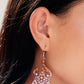 Paparazzi Accessories - Chandelier Command - Multi Earrings three rhinestone-encrusted teardrops drip from the bottom of an ornate decorative frame, creating an elegant fringe. The decorative frame swirls with ombré rhinestones that go from orange to pink to blue shades in varying sizes for a timelessly over-the-top sparkle. Earring attaches to a standard fishhook fitting.

Sold as one pair of earrings.


