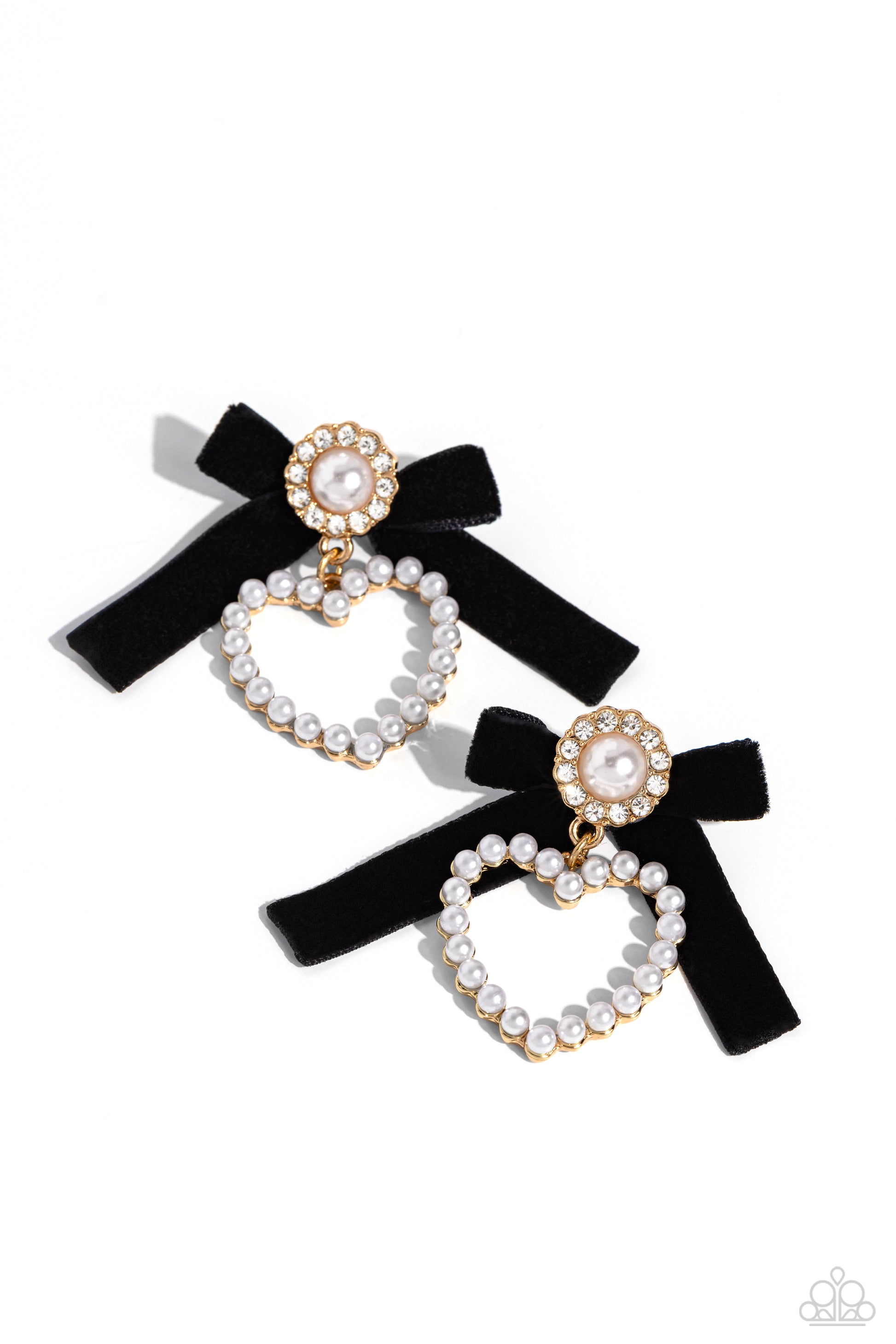 Paparazzi Accessories BOW and Then - Gold Earrings a solitaire white pearl, pressed in a white rhinestone-encrusted gold hoop, gleams atop a pearl-dotted heart frame resulting in a dazzling statement piece. A black velvet ribbon fans out from the pearly centerpiece further infusing the design with elegance. Earring attaches to a standard post fitting.  Sold as one pair of post earrings.