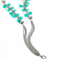 Paparazzi Accessories - Shell Sensation - Green Necklaces flared between two oversized silver beads, a collection of turquoise and white shell-like beads give way to sections of silver chains that connect across the chest for a colorful summery look. A lobster clasp hangs from the bottom of the elongated design to allow a name badge or other item to be attached. Features an adjustable clasp closure.  Sold as one individual lanyard. Includes one pair of matching earrings.
