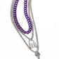 Paparazzi Accessories - Locked Labor - Purple Necklaces a sleek silver lock and silver key trickle from the bottoms of glistening silver chains down the chest, creating industrial layers. A purple curb chain hangs above the pendants for a touch of colorfully gritty sheen. Features an adjustable clasp closure.  Sold as one individual necklace. Includes one pair of matching earrings.