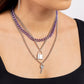 Paparazzi Accessories - Locked Labor - Purple Necklaces a sleek silver lock and silver key trickle from the bottoms of glistening silver chains down the chest, creating industrial layers. A purple curb chain hangs above the pendants for a touch of colorfully gritty sheen. Features an adjustable clasp closure.  Sold as one individual necklace. Includes one pair of matching earrings.