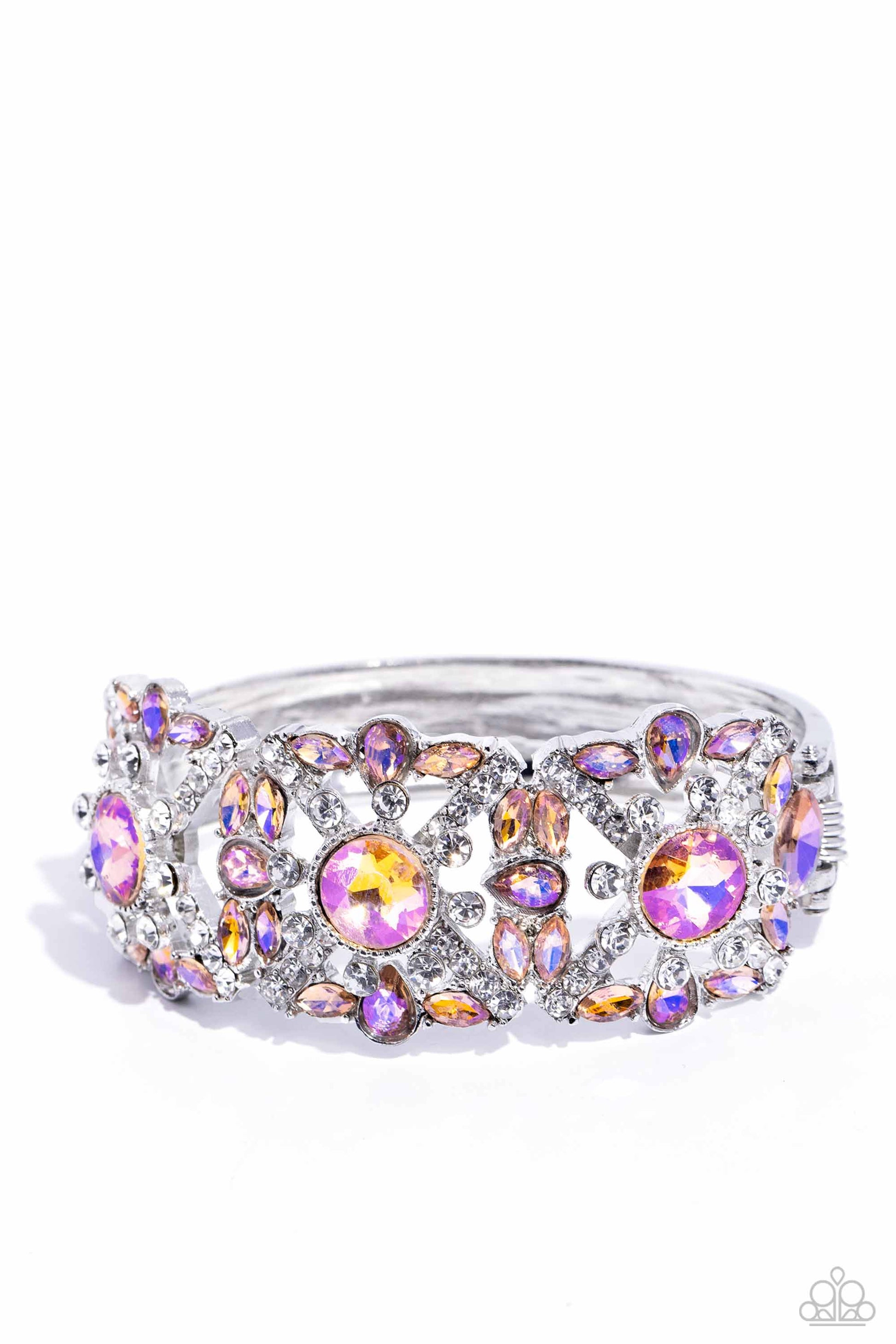Paparazzi Accessories - Shimmering Solo - January 2024 Life of the Party - Orange Bracelets various orange and white rhinestones in round, teardrop, and marquise cuts sparkle atop airy, silver frames, connected to a silver bangle-like bracelet around the wrist for a jaw-dropping dazzle. Features a hinged closure.  Sold as one individual bracelet.