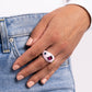 Paparazzi Accessories - Blinding Behavior - Pink Rings a thick band of silver, featuring a light pink hue, arcs across the top of the finger, creating an exaggerated rounded frame. An emerald-cut fuchsia gem and two round Kohlrabi and blue gems scatter across the surface for a blinding finish. Features a dainty stretchy band for a flexible fit.  Sold as one individual ring.