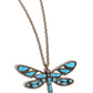 Paparazzi Accessories - Flying Low - Brass Necklaces featuring a classic brass chain, various cuts of turquoise stone are passed into an oversized, airy brass dragonfly pendant for a rustically earthy centerpiece. Features an adjustable clasp closure. As the stone elements in this piece are natural, some color variation is normal.  Sold as one individual necklace. Includes one pair of matching earrings.