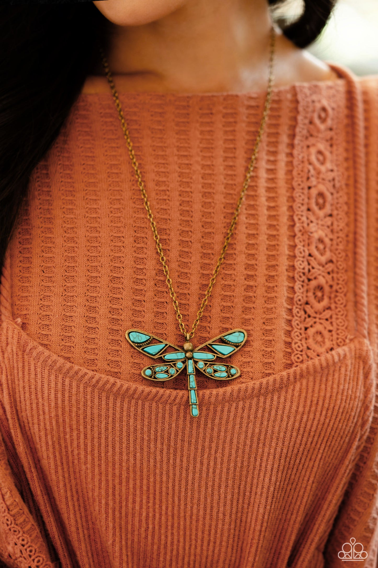 Paparazzi Accessories - Flying Low - Brass Necklaces featuring a classic brass chain, various cuts of turquoise stone are passed into an oversized, airy brass dragonfly pendant for a rustically earthy centerpiece. Features an adjustable clasp closure. As the stone elements in this piece are natural, some color variation is normal.  Sold as one individual necklace. Includes one pair of matching earrings.