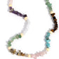 Paparazzi Accessories -Soothing Stones - Multi Necklace infused on an invisible wire, chiseled turquoise, jade, rose quartz, lapis, amethyst, clear white, gray, and tiger's eye stones coalesce around the collar for a colorfully, earthy statement. White wood beads sporadically dot amongst the chiseled collection for an additional artisanal touch. Features an adjustable clasp closure. As the stone elements in this piece are natural, some color variation is normal.