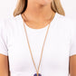 Paparazzi Accessories - Tied Triumph - Multi Necklace featuring purple and brown marbling, an airy blue flower is knotted at the bottom of a lengthened strand of brown suede for a southwestern-inspired statement. Features an adjustable tie closure.  Sold as one individual necklace. Includes one pair of matching earrings.