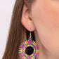 Paparazzi Accessories - Ferris Wheel Finale - Multi Earrings featuring bright red, purple, yellow, orange, Rose Violet, and turquoise colors, round beads adorn the inner circle of a whimsical silver studded frame, while emerald-cut beads in the same shades encrust along the outer curve of the hoop for a spinning display of color. Earring attaches to a standard fishhook fitting.  Sold as one pair of earrings.