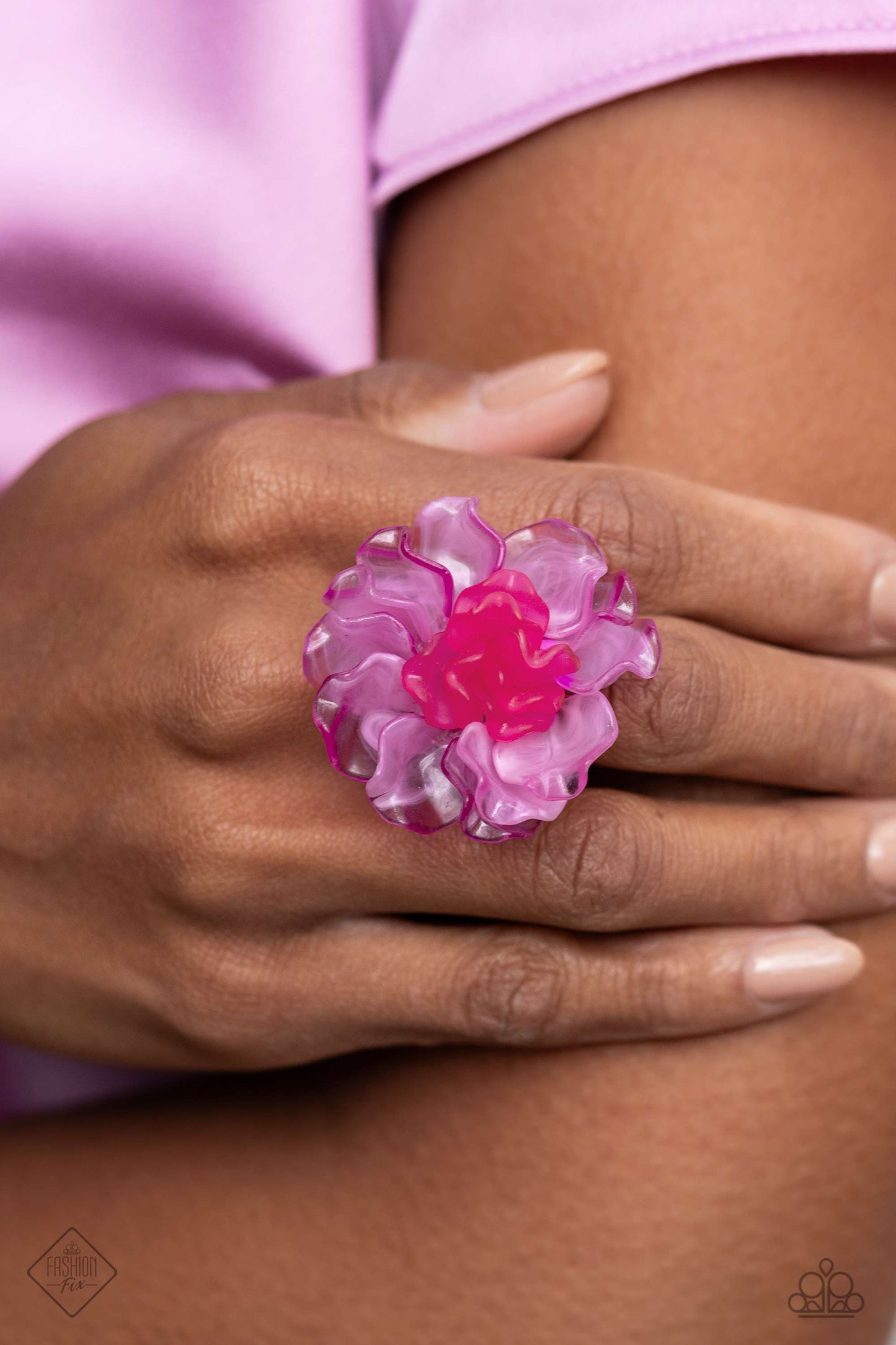 Paparazzi AccessoriesPaparazzi - Lush Lotus - Pink Rings rippling in curved textures, cloudy Radiant Orchid petals bloom from a daintier collection of matte Viva Magenta petals atop airy silver bands for a whimsical, oversized display. Features a stretchy band for a flexible fit.  Sold as one individual ring.