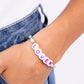 Paparazzi Accessories - Love Language - Multi Bracelets infused on an elastic stretchy band, white pearls, multicolored seed beads, silver studs, and white beads with hot pink letters spelling out the word "LOVE" with a hot pink heart bead as it wraps around the wrist for a sentimental, youthful display.  Sold as one individual bracelet.
