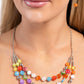 <p data-mce-fragment="1">Paparazzi Accessories - Summer Scope - Multi Necklaces sttached and separated by shiny silver beads, three rows of alternating vibrant multicolored beads, silver studs, and floral-inspired beads layer across the collar, creating a colorful canvas. Features an adjustable clasp closure.</p> <p data-mce-fragment="1"><i data-mce-fragment="1">Sold as one individual necklace. Includes one pair of matching earrings.</i></p>