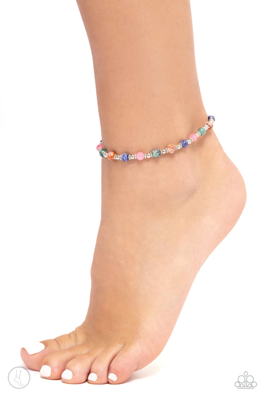 <p>Paparazzi Accessories - Tranquil Tribute - Multi Anklet infused with silver accents and floral beads, a colorful collection of natural stones are threaded around the ankle for a tranquil look. As the stone elements in this piece are natural, some color variation is normal.</p> <p><i>Sold as one individual anklet.</i></p> <p><i>Order date 2/22/24</i></p>