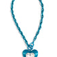 <p data-mce-fragment="1">Bordered in linear textures, an oversized white heart gem is pressed into an electric blue heart frame below the collar. The flirtatious pendant attaches to a thick, electric blue chain, resulting in a modern-inspired romance. Features a lariat closure.</p> <p data-mce-fragment="1"><i data-mce-fragment="1">Sold as one individual necklace. Includes one pair of matching earrings.</i></p>