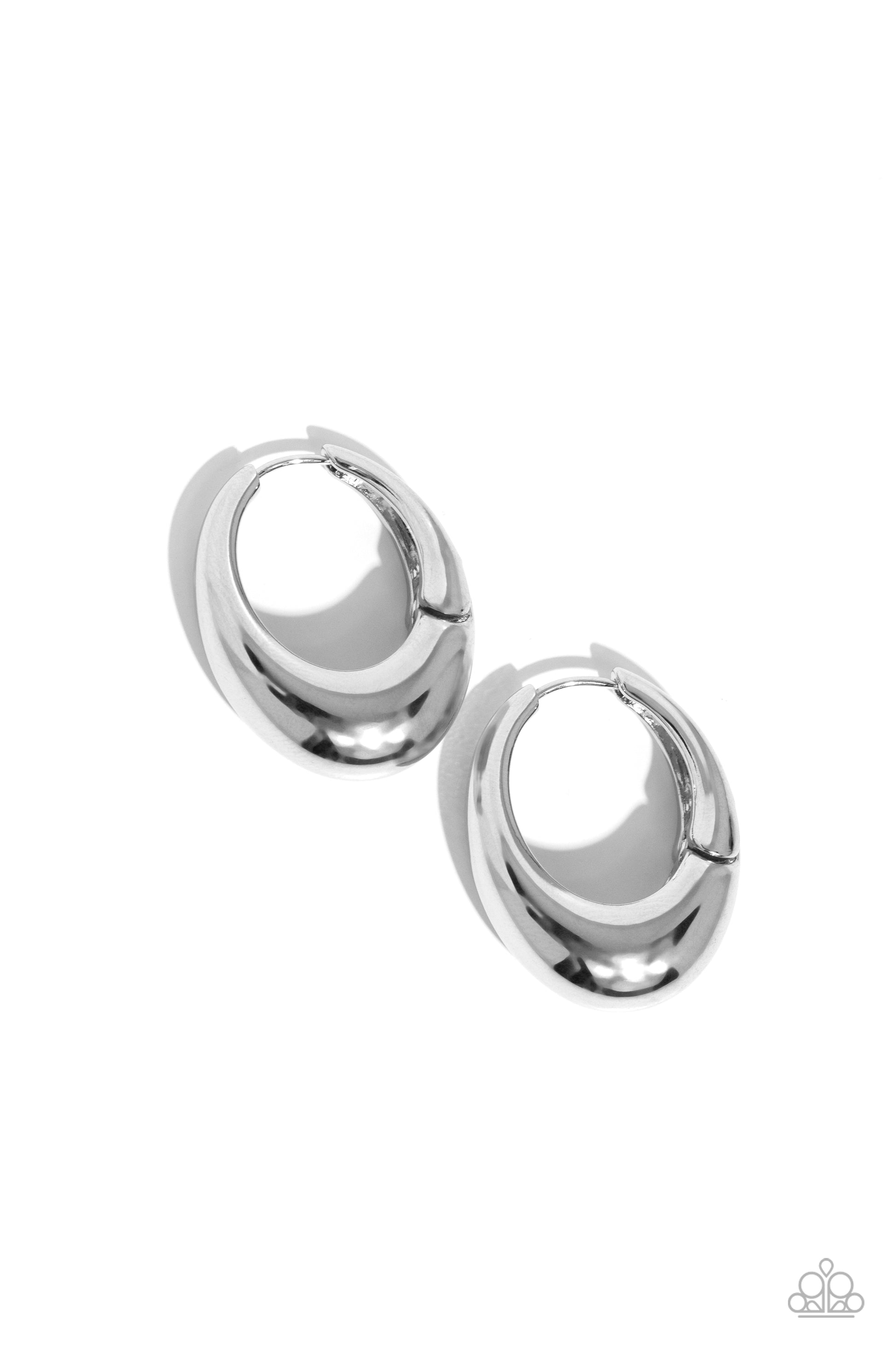 <p>Paparazzi Accessories - Oval Official - Silver Hoop Earrings featuring a thick surface, an elongated silver hoop curls around the ear for a sleek basic look. Earring attaches to a standard hinge closure fitting. Hoop measures approximately 3/4" in diameter.</p> <p><i>Sold as one pair of hinge hoop earrings.</i></p>