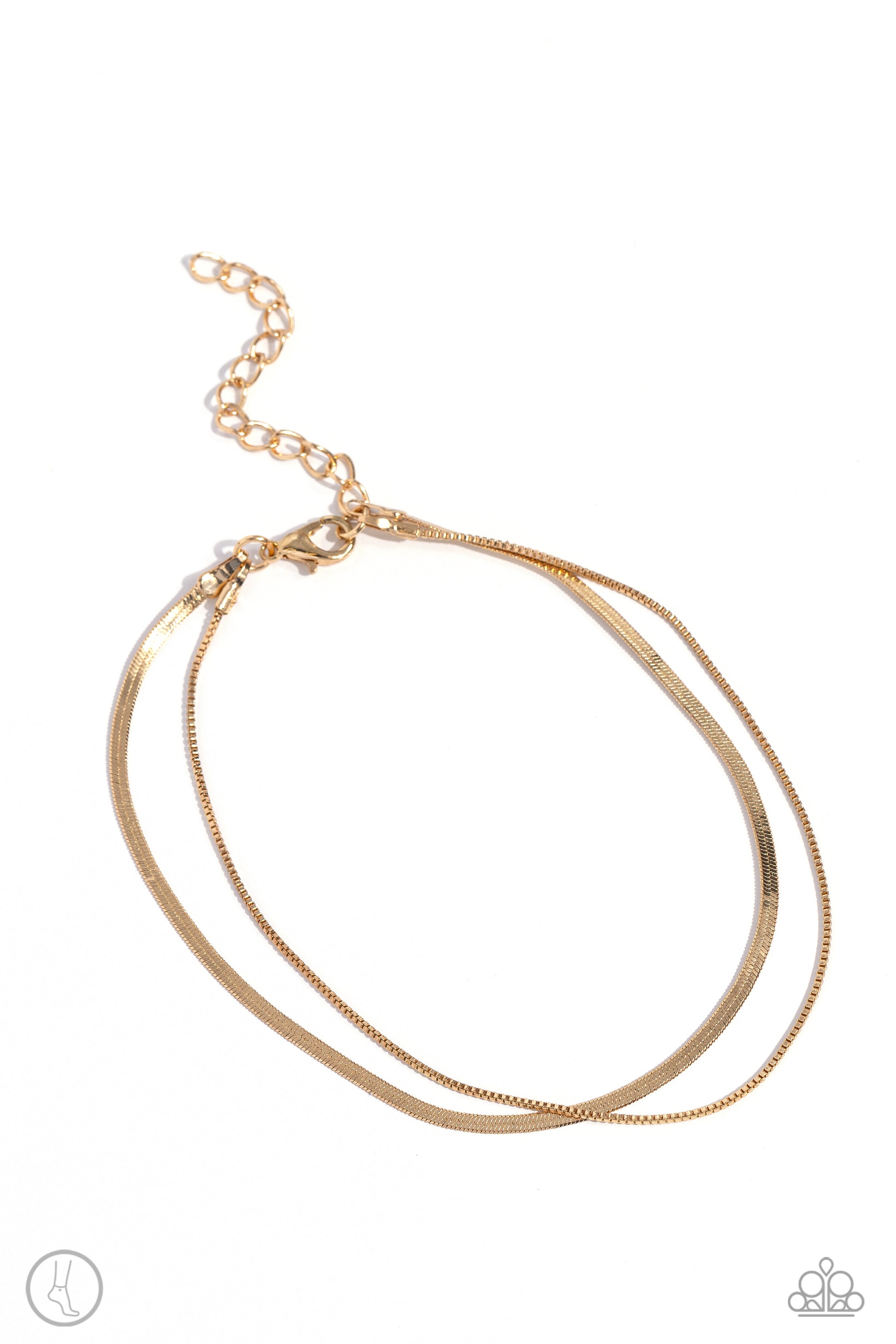 <p>Paparazzi Accessories - Glistening Gauge - Gold Anklets a strand of flat gold snake chain collides with a dainty square box chain to create an abstract monochromatic display. Features an adjustable clasp closure.</p> <p><i>Sold as one individual anklet.</i></p>