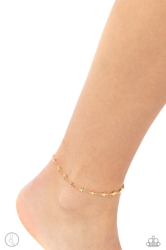 Paparazzi Accessories - Starry Swing Dance - Gold Anklet dainty gold stars are infused along a classic gold chain around the ankle for a simply stellar statement. Features an adjustable clasp closure.Sold as one individual anklet.