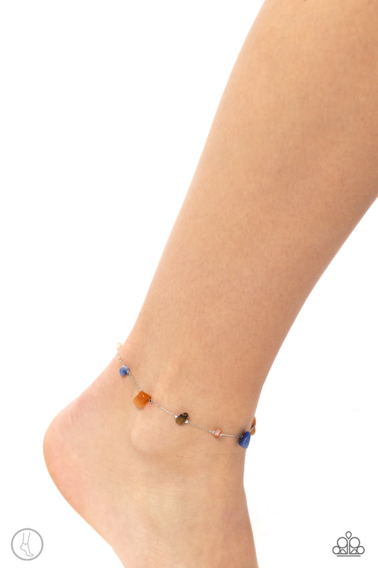 <p>Paparazzi Accessories - Gemstone Grace - Multi Anklets Infused along a silver chain, chiseled multicolored and tiger's eye stones wrap around the ankle for a simply stony statement. Features an adjustable clasp closure. As the stone elements in this piece are natural, some color variation is normal.</p> <p><i>Sold as one individual anklet.</i></p>