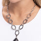 <p data-mce-fragment="1">Paparazzi Accessories - Tangible Tranquility - Black Necklaces swinging from a collection of hammered silver rings, an oversized abstract black-and-white stone teardrop creates an earthy everyday look. Features an adjustable clasp closure. As the stone elements in this piece are natural, some color variation is normal.</p> <p data-mce-fragment="1"><i data-mce-fragment="1">Sold as one individual necklace. Includes one pair of matching earrings.</i></p>