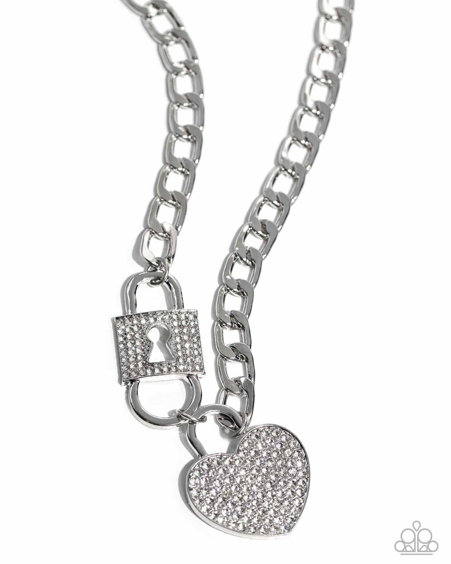 Embellished with glistening white rhinestones, a silver lock pendant and heart padlock interconnect from a silver curb chain for a romantic-inspired display of shimmer. Features an adjustable clasp closure.  Sold as one individual necklace. Includes one pair of matching earrings.