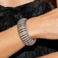 <p>Paparazzi Accessories - Appealing A-Lister - White Bracelets featuring glistening white gems, trios of curved silver bars join high-sheen curved silver bars for a radiant, light-catching display around the wrist on elastic stretchy bands.</p> <p><i>Sold as one individual bracelet.</i></p>