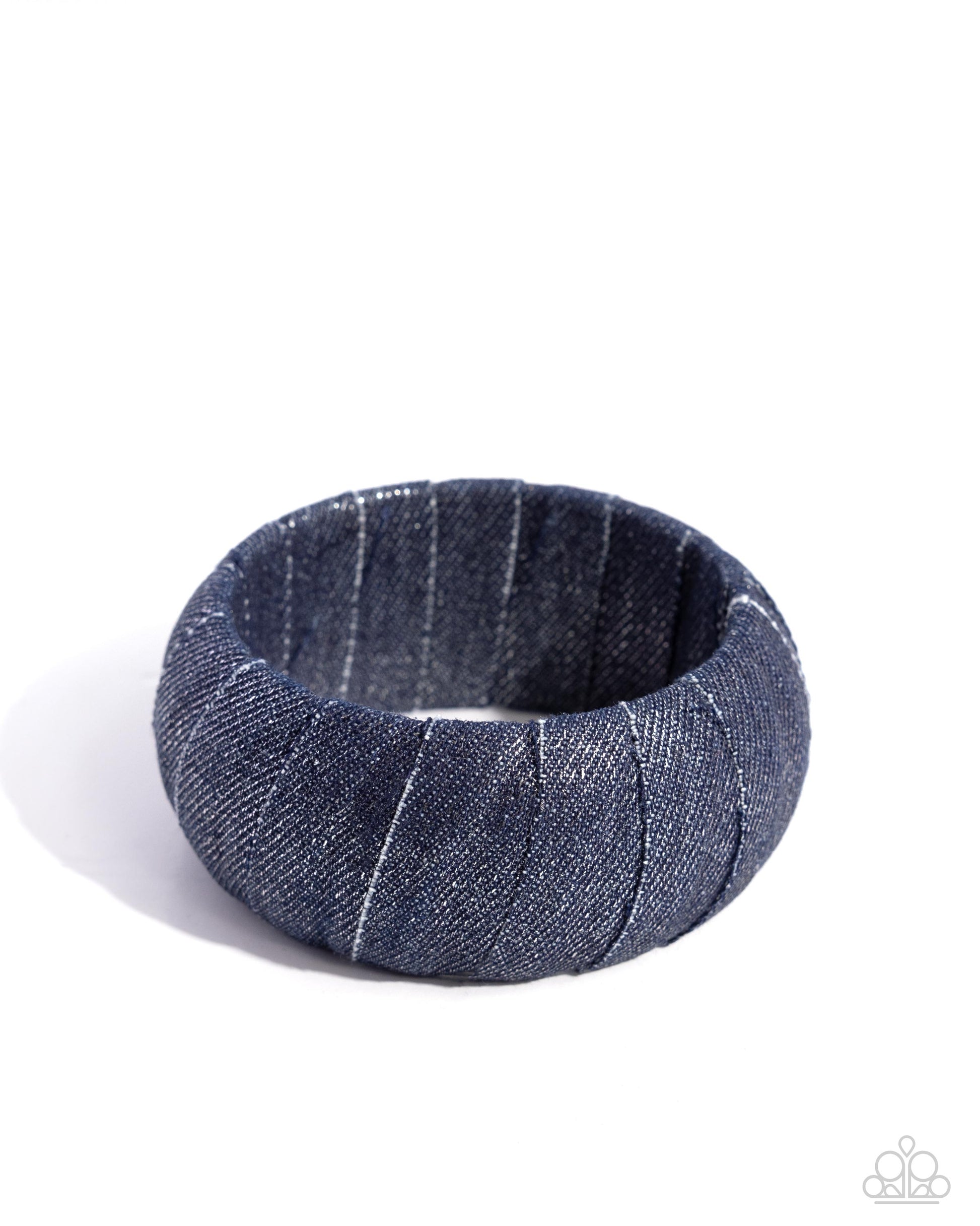 <p data-mce-fragment="1">Paparazzi Accessories - Denim Delight - Blue Bracelets featuring various washes of denim, a textured blue bracelet wraps around the wrist for a rustic centerpiece.</p> <p data-mce-fragment="1"><i data-mce-fragment="1">Sold as one individual bracelet.</i></p>