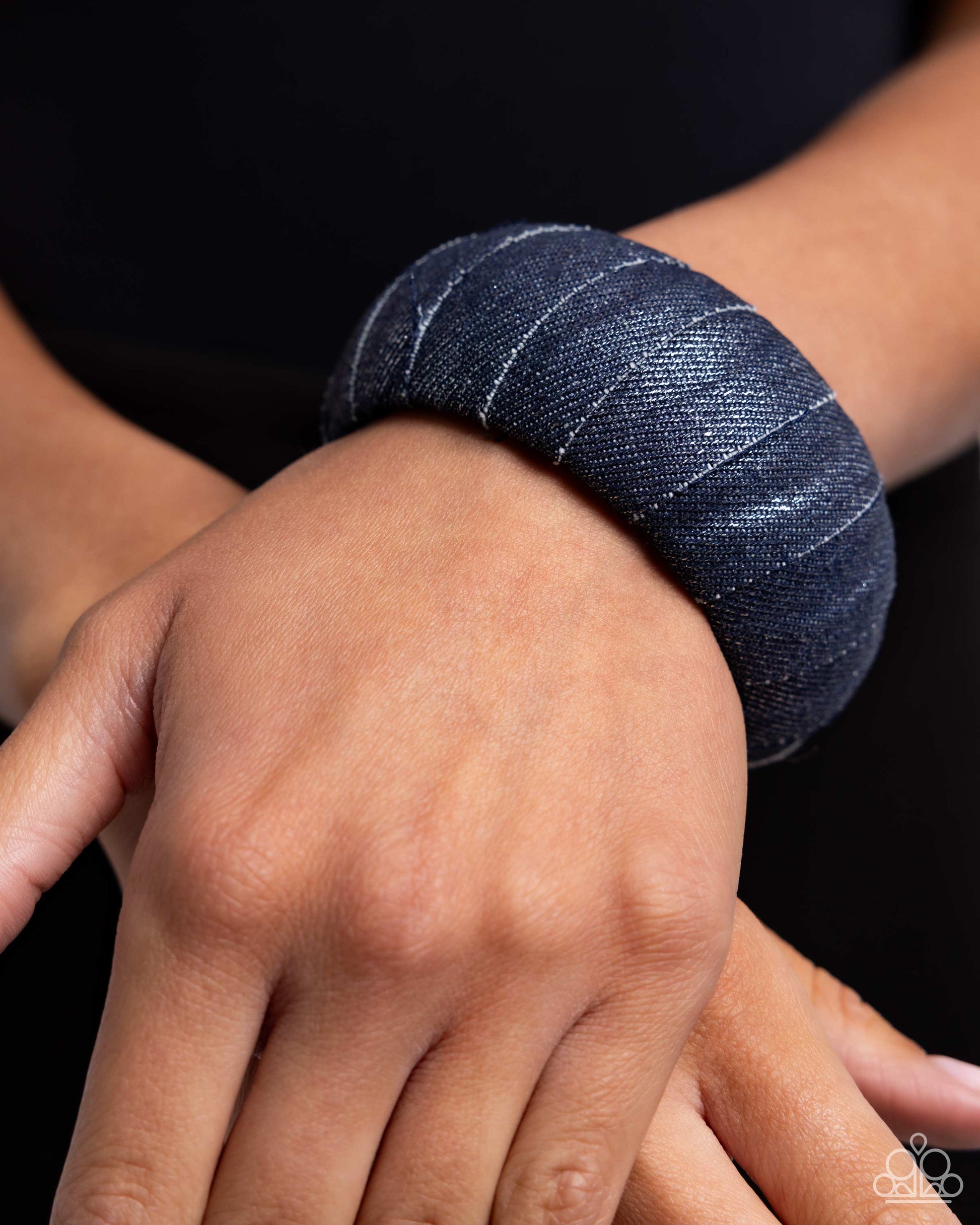 <p data-mce-fragment="1">Paparazzi Accessories - Denim Delight - Blue Bracelets featuring various washes of denim, a textured blue bracelet wraps around the wrist for a rustic centerpiece.</p> <p data-mce-fragment="1"><i data-mce-fragment="1">Sold as one individual bracelet.</i></p>