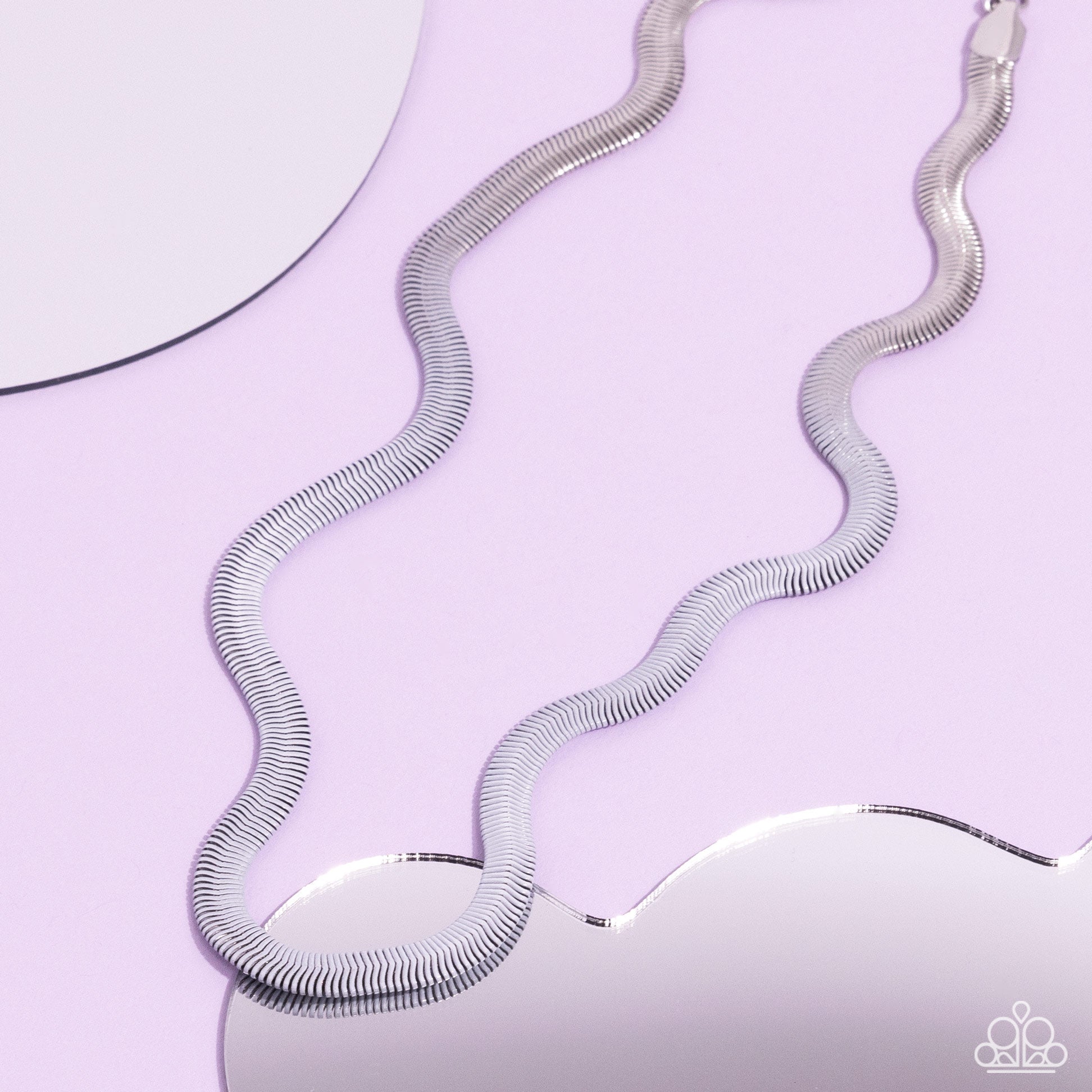 <p>Paparazzi Accessories - Spray Paint Sass - White Necklaces featuring a spray paint effect, a silver snake chain slowly fades from silver to white as it loops around the neckline for a charismatically colorful display. Features an adjustable clasp closure.</p> <p><i>Sold as one individual necklace. Includes one pair of matching earrings.</i></p>