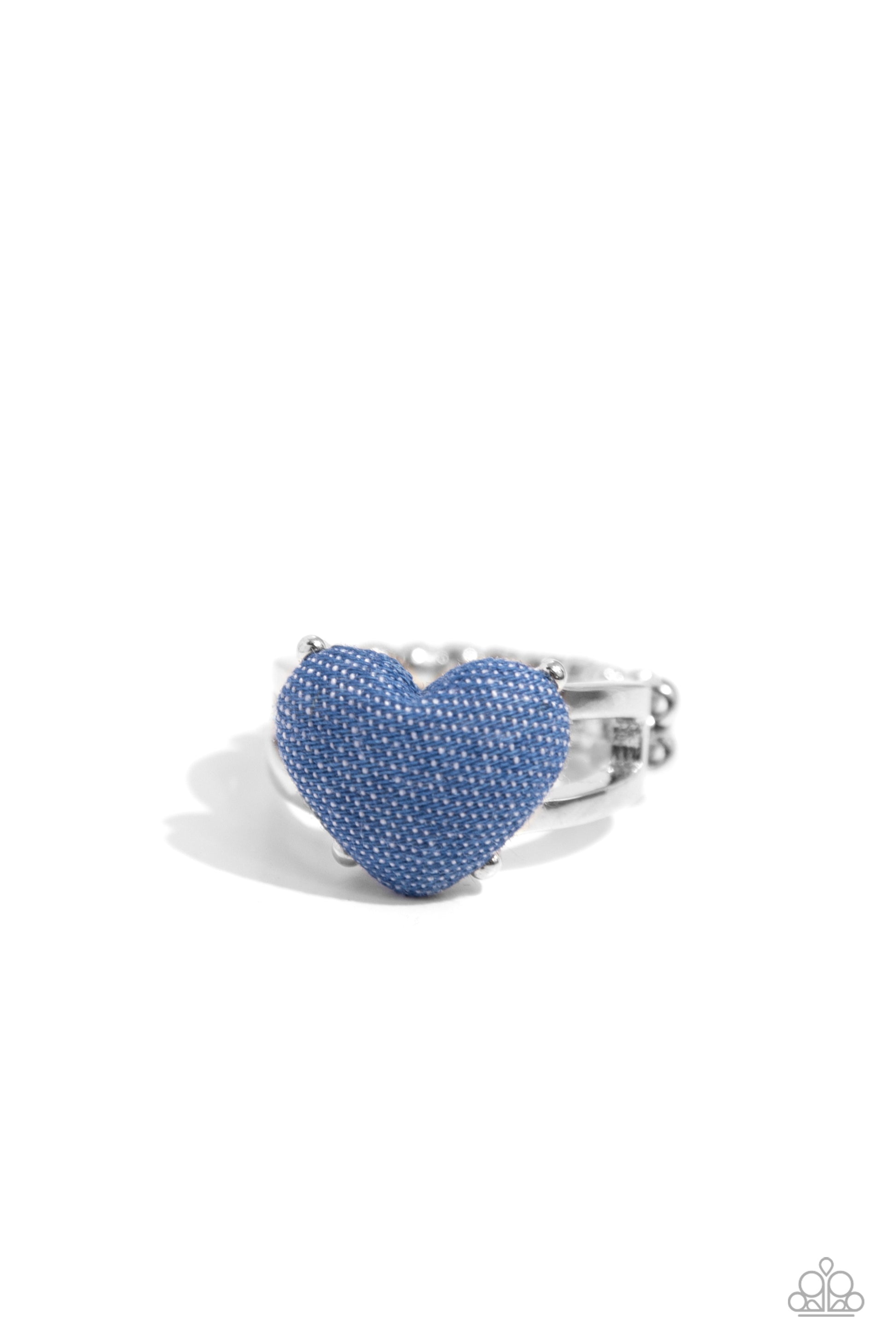 <p data-mce-fragment="1">Paparazzi Accessories - Denim Daydream - Blue Rings featuring a denim-like texture, a light-wash heart is centered amongst airy silver bands atop the finger for a rugged centerpiece. Features a dainty stretchy band for a flexible fit.</p> <p data-mce-fragment="1"><i data-mce-fragment="1">Sold as one individual ring.</i></p>