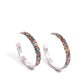 <p>Paparazzi Accessories - Stacked Symmetry - Multi Hoop Earrings set in silver square fittings, row after row of multicolored rhinestones are embellished around a silver hoop for a dazzling design. Earring attaches to a standard post fitting. Hoop measures approximately 2" in diameter.</p> <p><i>Sold as one pair of hoop earrings.</i></p>