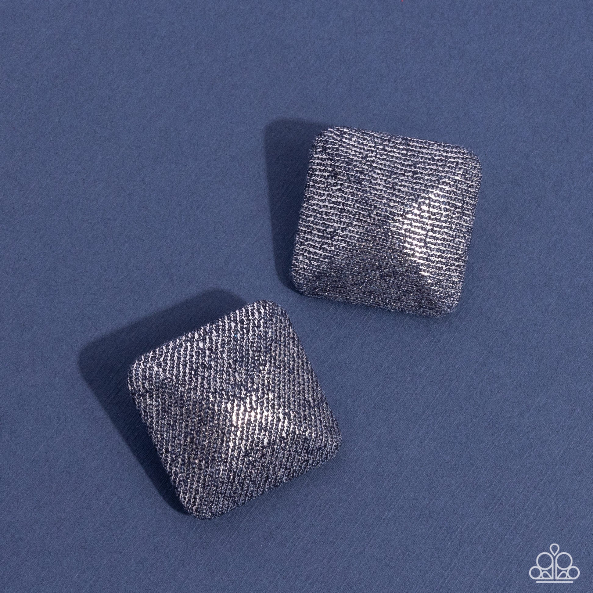 <p>Paparazzi Accessories - Commercially Corporate - Silver Earrings featuring a fabric-like texture, metallic silver squares reflect light off every rounded surface for a corporate-inspired design. Earring attaches to a standard post fitting.</p> <p><i>Sold as one pair of post earrings.</i></p>
