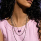 <p>Paparazzi Accessories - Colorful Cadet - Purple Necklaces three mismatched silver chains cascade and layer along the neckline for a sleek look. Strung along the uppermost dainty silver chain, a collection of hot pink, lavender, and purple-painted silver rings add an optimistic splash of color to the look. Features an adjustable clasp closure.</p> <p><i>Sold as one individual necklace. Includes one pair of matching earrings.</i></p>