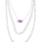 <p>Paparazzi Accessories - Colorful Cadet - Purple Necklaces three mismatched silver chains cascade and layer along the neckline for a sleek look. Strung along the uppermost dainty silver chain, a collection of hot pink, lavender, and purple-painted silver rings add an optimistic splash of color to the look. Features an adjustable clasp closure.</p> <p><i>Sold as one individual necklace. Includes one pair of matching earrings.</i></p>