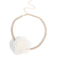 <p>Paparazzi Accessories - Rosy Range - Gold Necklaces a double-stranded gold chain is embellished with two rows of glistening white rhinestones as it wraps around the collar. An ivory tulle rosette is placed in the center of the design for a floral finish. Features an adjustable clasp closure.</p> <p><i>Sold as one individual choker necklace. Includes one pair of matching earrings.</i></p>