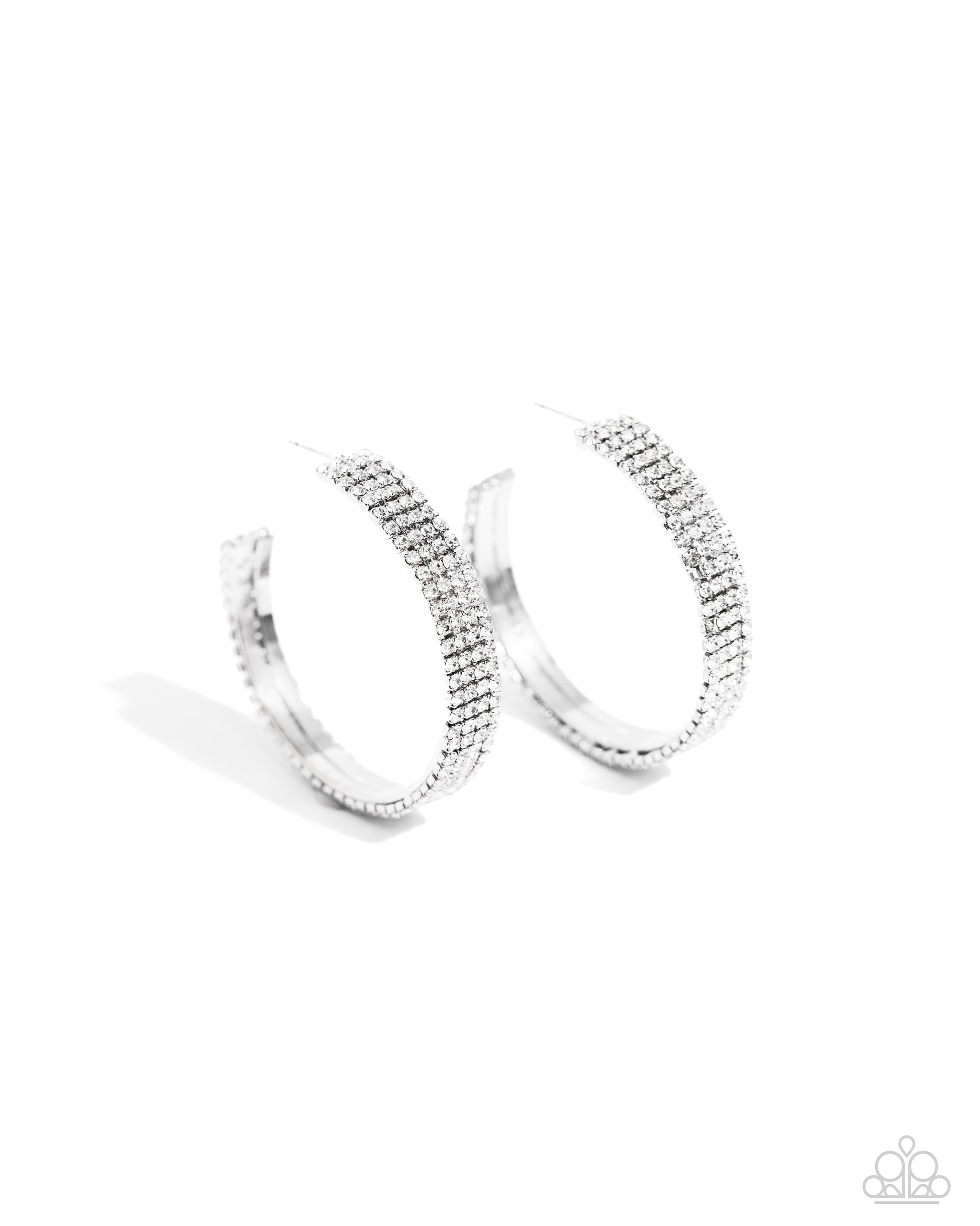 Paparazzi Accessories - Stacked Symmetry - White Hoop Earrings set in silver square fittings, row after row of white rhinestones are embellished around a silver hoop for a dazzling design. Earring attaches to a standard post fitting. Hoop measures approximately 2" in diameter. Sold as one pair of hoop earrings.