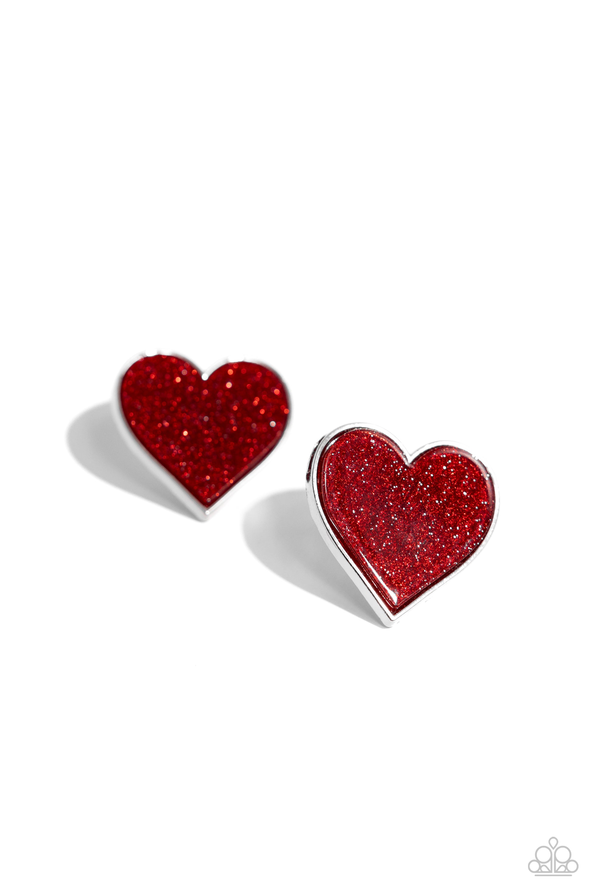 <p>Paparazzi Accessories - Glitter Gamble - Red Heart Earrings dusted in sparkles, red hearts, pressed in sleek silver frames neatly sparkle atop the lobes for a flirtatious centerpiece. Earring attaches to a standard post fitting.</p> <p><i>Sold as one pair of post earrings.</i></p>
