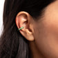 <p>Paparazzi Accessories - Coastal Color - Green Ear Cuffs featuring a green painted surface, a white rhinestone-dotted silver cuff curls around the ear, creating an adjustable, one-size-fits-all colorful cuff.</p> <p><i>Sold as one pair of cuff earrings.</i></p>