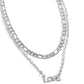 Paparazzi Accessories - Lovely Layers - Multi Necklace featuring multicolored iridescent rhinestones, a pendant spelling out the word "LOVE" is attached to the lowermost strand of two mismatched silver chain layers for a radiantly romantic statement. Features an adjustable clasp closure. Due to its prismatic palette, color may vary.  Sold as one individual necklace. Includes one pair of matching earrings.