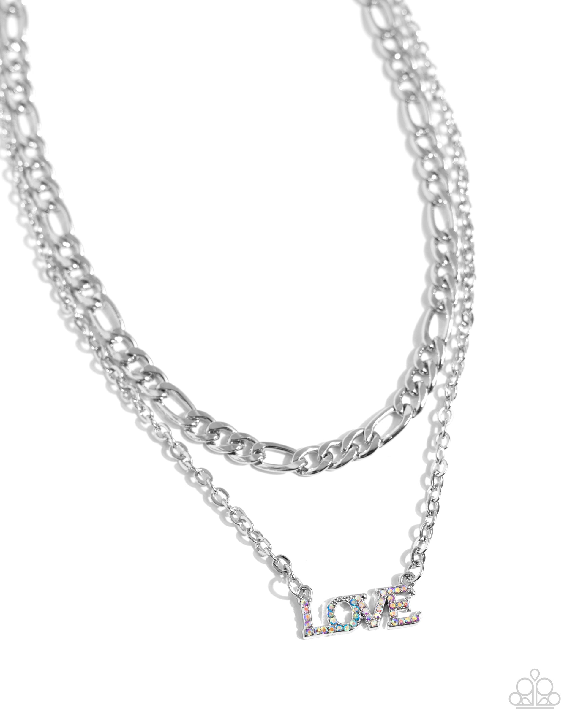Paparazzi Accessories - Lovely Layers - Multi Necklace featuring multicolored iridescent rhinestones, a pendant spelling out the word "LOVE" is attached to the lowermost strand of two mismatched silver chain layers for a radiantly romantic statement. Features an adjustable clasp closure. Due to its prismatic palette, color may vary.  Sold as one individual necklace. Includes one pair of matching earrings.